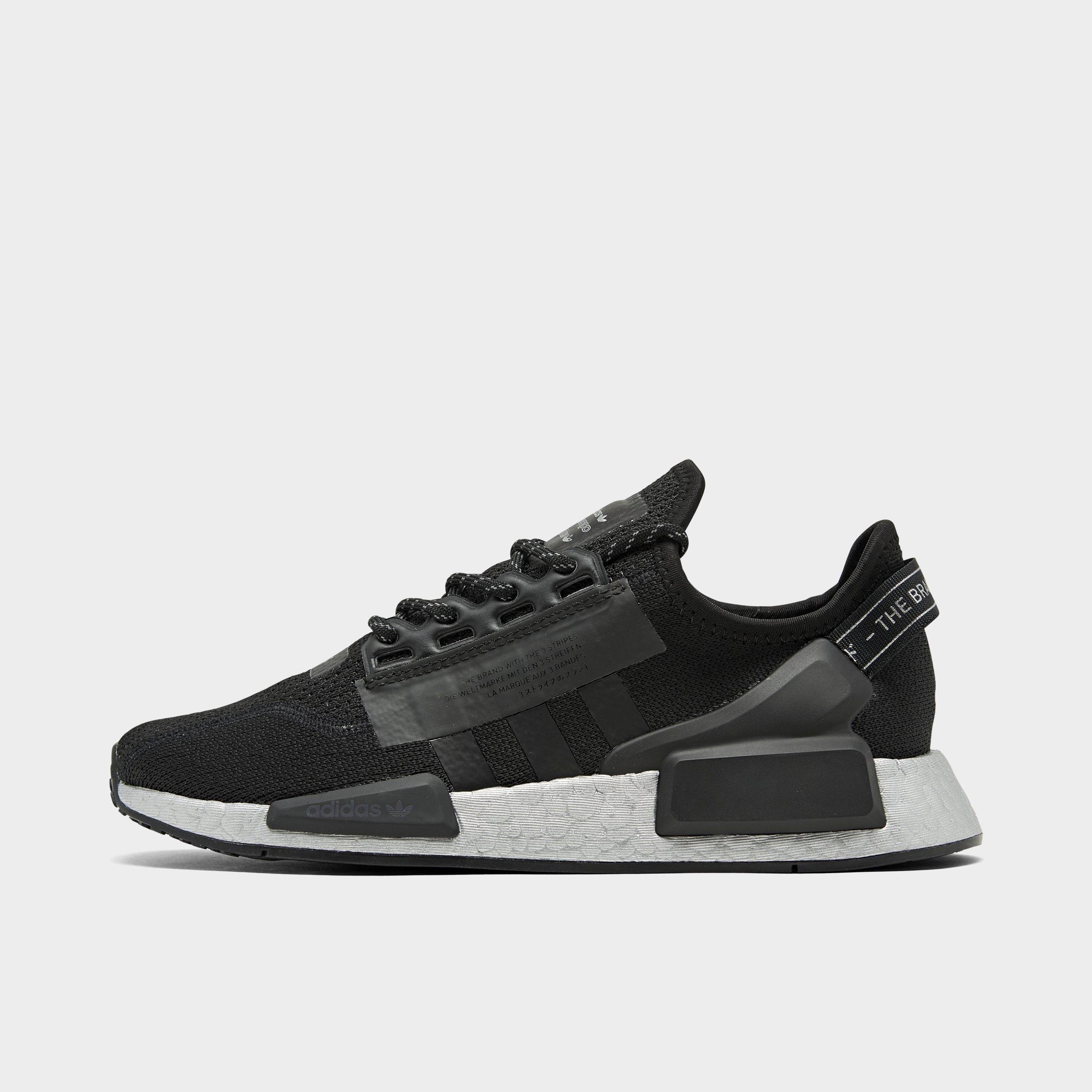 Shoes In Your Hand A Package With Shoes ADIDAS NMD R1
